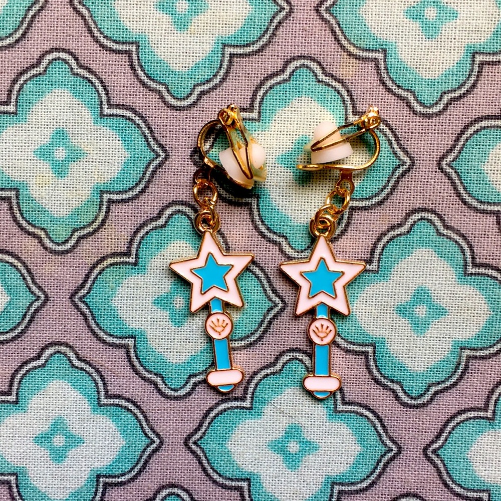 8 pairs of clip on earrings/have never been worn